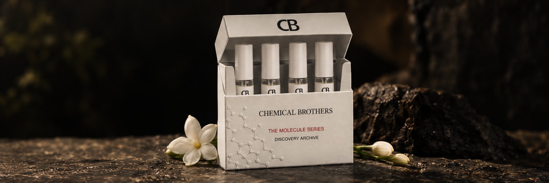 The Discovery Archive coffret, open, with its four vials